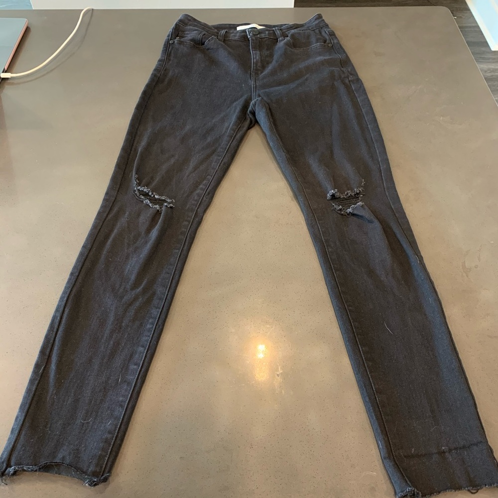High waisted jeans with knee holes